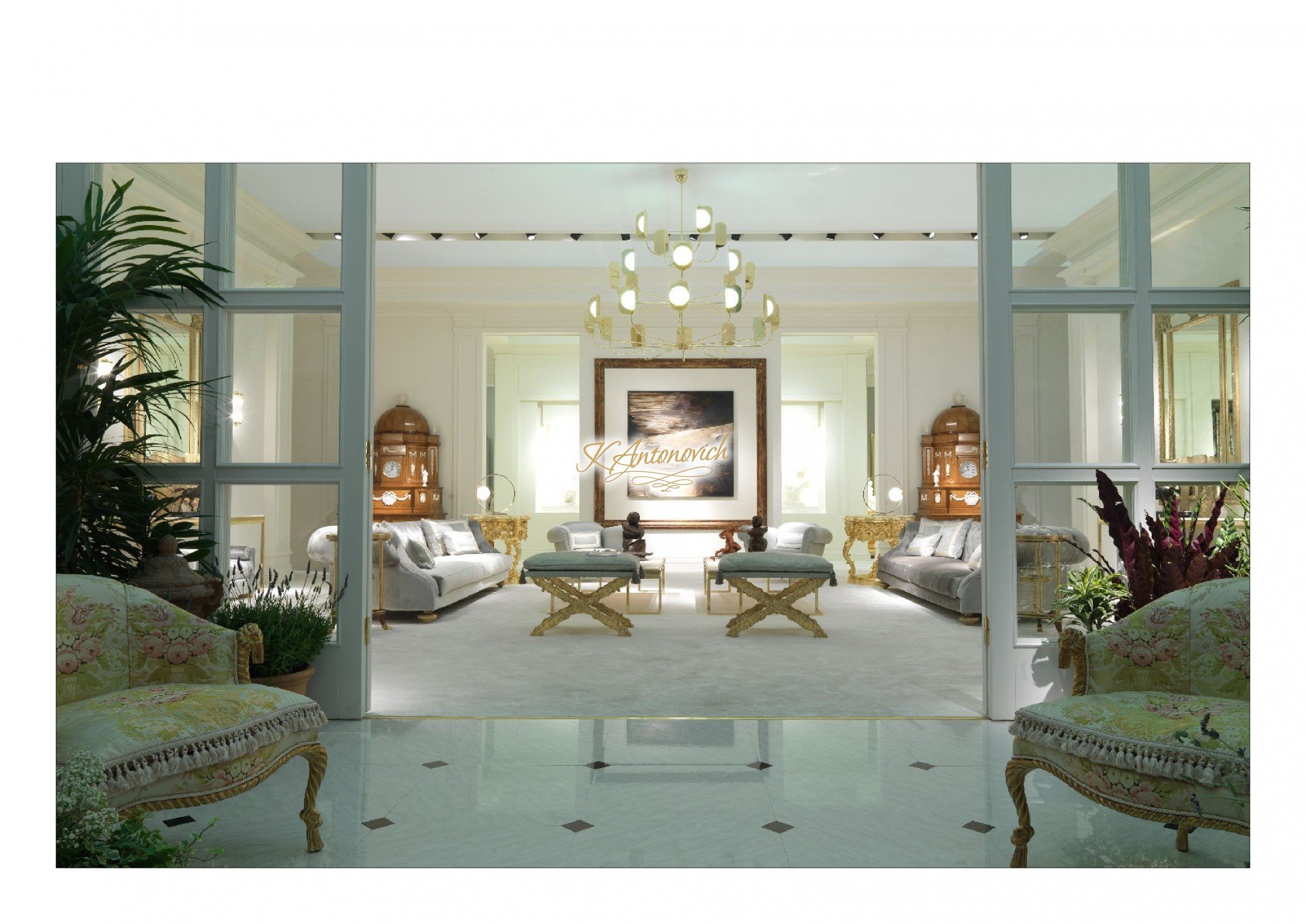 This picture shows a white four-poster bed with two tall upholstered headboards in the center, flanked by two teal nightstands with gold handles and crystal table lamps. In the foreground, you can see a large, patterned beige and brown rug and a white chair with a teal throw pillow.