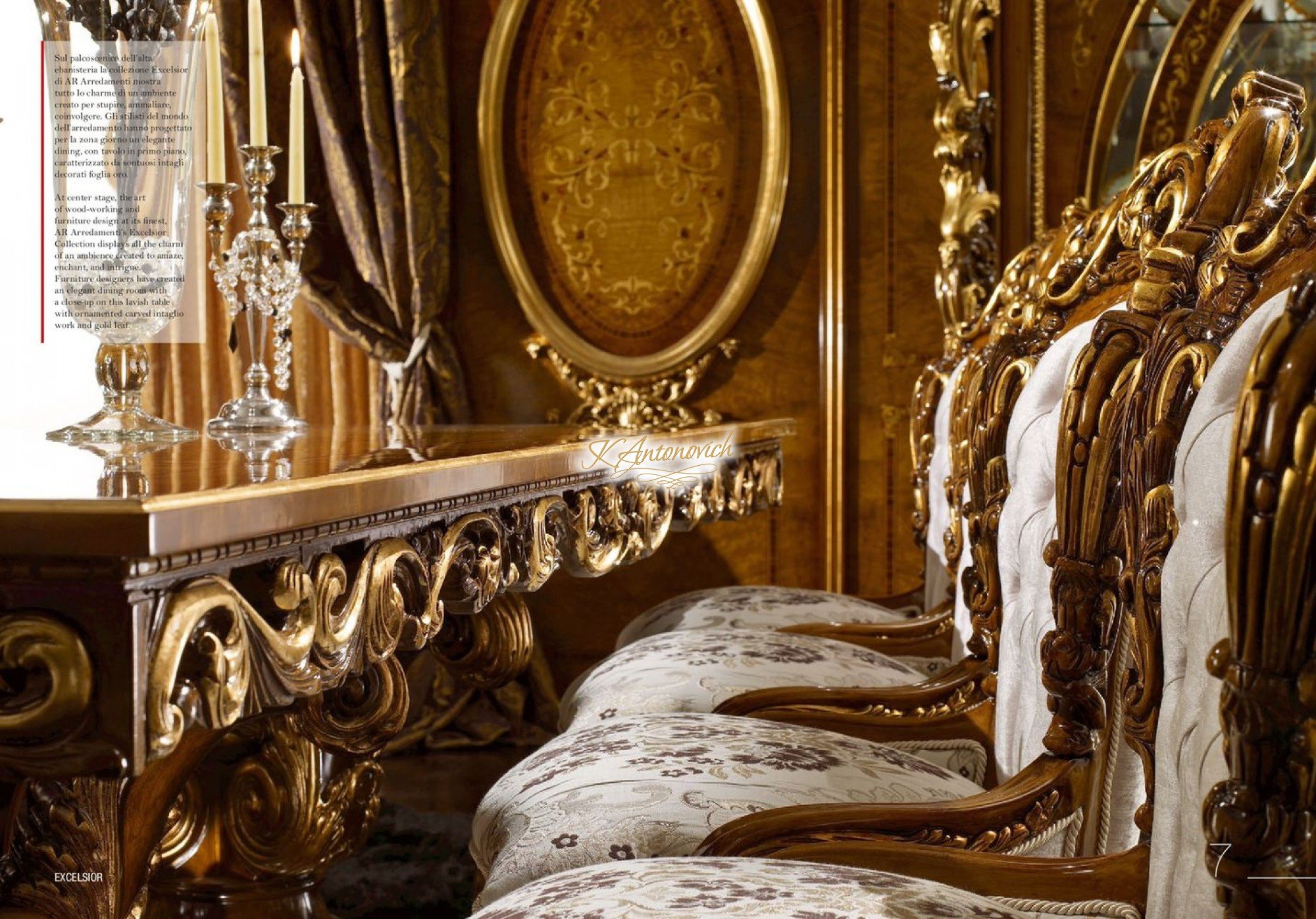 This picture shows an ornately decorated luxurious hallway with a grand entryway. The walls are covered in golden detailing and the floor is tiled with cream and black marble. On either side of the entryway, there are two tall statuettes of lions that guard the entrance. At the end of the hallway, there is a set of large glass doors that lead out to a terrace overlooking a garden.