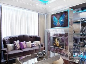 Luxury modern interior with marble walls and floors, large windows, sofas and stylish lamps.