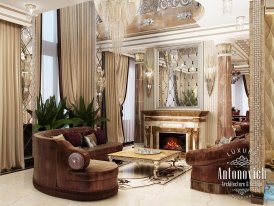 This picture shows a modern, glamorous living room with a luxurious gold and black interior design. The plush seating includes a black velvet sofa, two matching armchairs, and two side chairs with animal pattern fabric upholstery. A glass coffee table and two side tables with gold finishes and matching black vases complete the seating area. An ornate gold chandelier hangs above and the walls are adorned with intricate wallpaper designs with touches of gold.