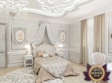 A stunning combination of a white hallway and stairs connecting two floors with modern railing with elegant details.