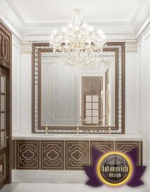 An elegant design of the entrance lobby with magnificent chandeliers and the marble floor to match the classy furniture.