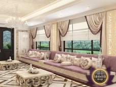 An elegant and sophisticated living room with a unique furniture set and exquisite decorations.