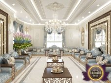 Modern luxury living room interior featuring a gold sofa, white walls and marble floors, with a yellow accent piece.