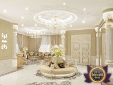 A modernly designed living room with a luxurious combination of sofa, rug, and curtains that create an elegant harmony.