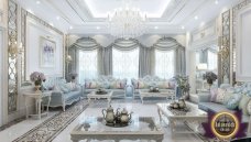 Luxurious dining room, perfect combination of elegance and comfort, surrounded with marble walls and a luxurious chandelier.
