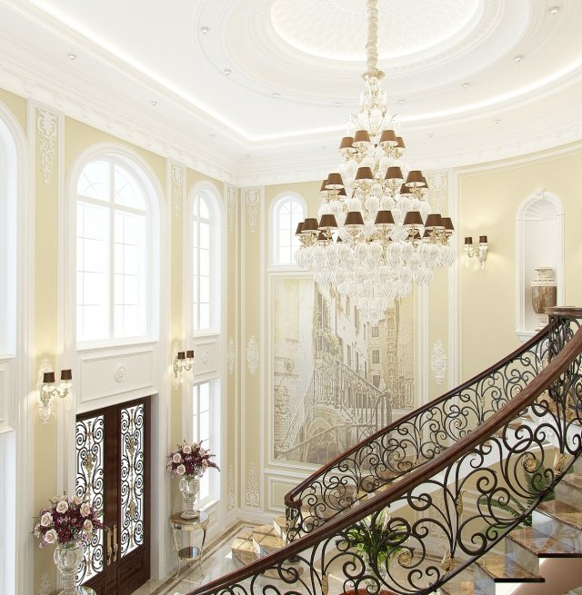 This exquisite interior design features a modern feel with luxurious touches of gold and a grand staircase.