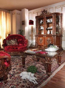 Delicate living room interior design with a beige sofa, ocher armchairs and a classic fireplace - perfect for relaxing with family.