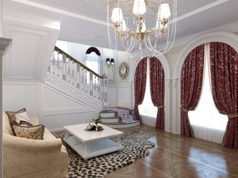 This picture shows a white-on-white interior design scheme, featuring white walls, white furniture, and white marble floors. The room has modern and minimalistic elements, such as the low-back chairs, low coffee table, and single large window. There is also a large area rug, which adds warmth and color to the predominantly white palette.