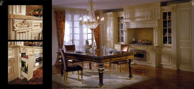 This image shows a luxurious and modern living area. It features a large sofa that is upholstered in white leather, with two matching armchairs arranged around a geometric glass-top coffee table. The space is decorated with faux fur rugs, a unique hanging light fixture, and shelves full of decorative items. In the corner of the room, a vertical marble fireplace stands out against a wall of floor-to-ceiling windows.