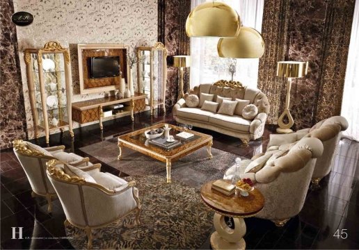 This picture shows a modern, luxurious bedroom featuring a large and comfortable bed with white sheets and pillows. Above the bed is an elegant crystal chandelier and in front of the bed is an artistic coffee table with ornate legs. The walls are covered in a light white fabric, and the floor is lined with a plush light blue carpet. A luxurious cream armchair sits in the corner and a large window provides an ample amount of natural light.