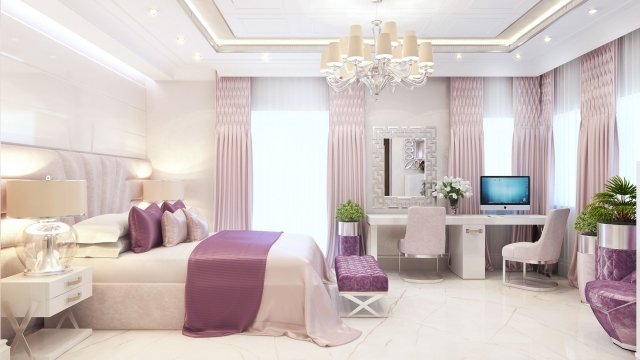 This picture is showing an interior design of a high-end luxury living room. The room has white walls with a patterned wall paper on one side, offset against a grey stone wall on the other side. In the center of the room is a large, ornate golden chandelier draped with white and beige fabric. The floors are tiled with a beige marble, with a soft grey rug underneath a black and white sofa set. The walls are further decorated with abstract art pieces and a large mirror with a gold frame.