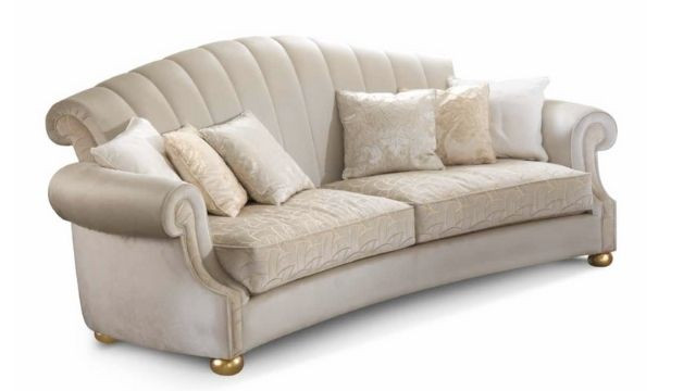 Luxury 4 seater padded sofa with fabric upholstery