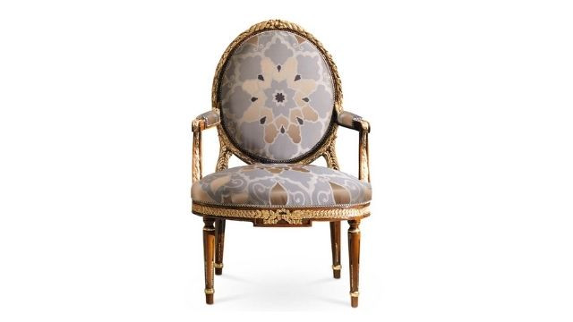 Stylish Walnut armchair with gold details