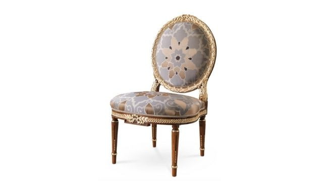 Stylish Walnut chair with gold details