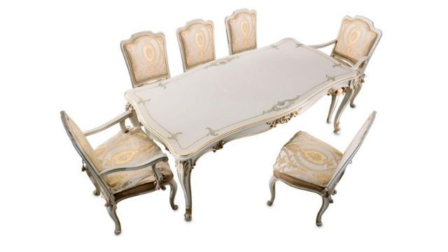 Luxury lacquered table with hand made decorations and with gold details